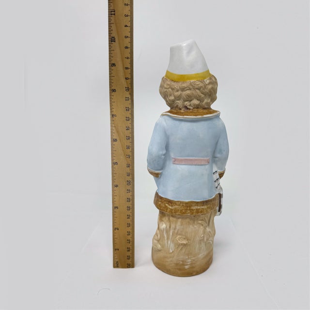 Add a touch of old-world charm to your collection with this beautiful Antique German Bisque Porcelain Figurine. Standing...