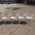 Late 20th Century Wrought Iron Scrolling Patio Dining Arm Chairs by Crown Leisure - Set of 4 For Sale - Image 17 of 18