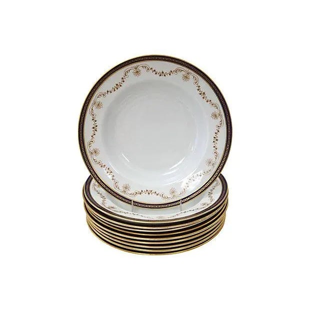 Twelve piece Copeland pasta set. Includes ten bowls and two tureens. Bowls, 10.25"Dia x 1.75"H; tureen, 11.5"L x 7"W x...