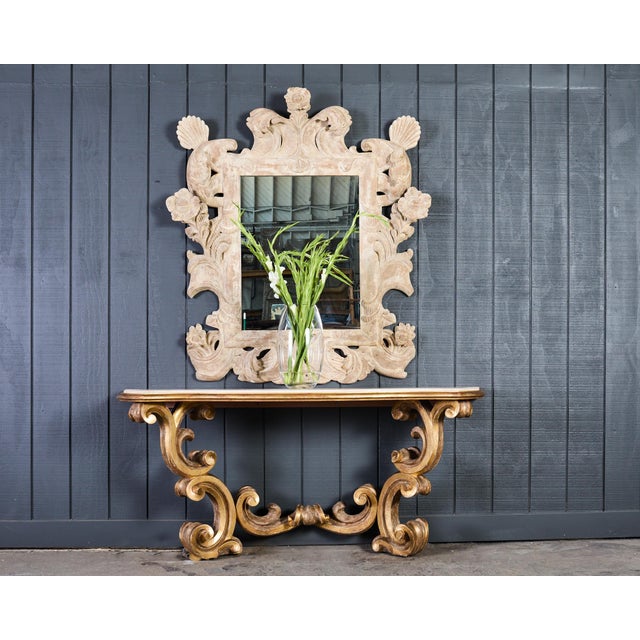Opulent baroque style console table featuring a honed French limestone top designed by Dennis and Leen Hollywood, CA. The...