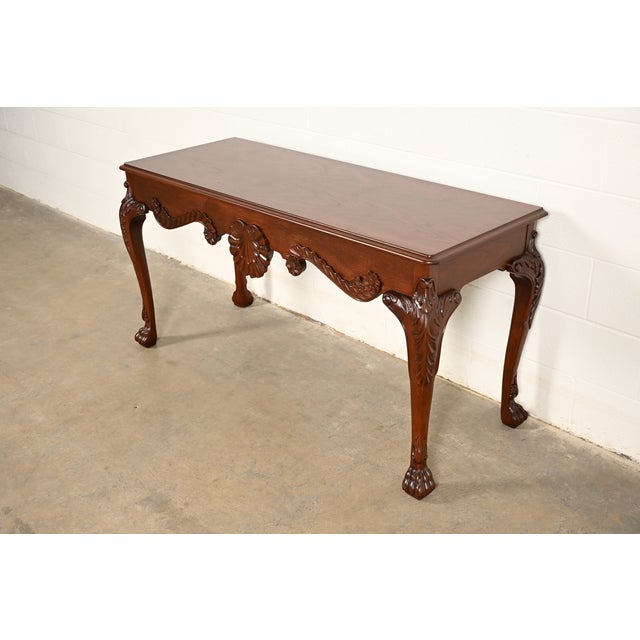 An exceptional Georgian or Chippendale style console table or sofa table By Baker Furniture USA, Circa 1980s Carved...