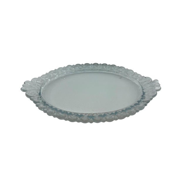 This charming tray, originally intended for perfume, has versatile uses. The edge of the tray has unique detailing....