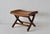 Hans Wegner-style folding stool/ottoman. Beautifully crafted, sturdy, well-made, and also foldable for compact storage. It...