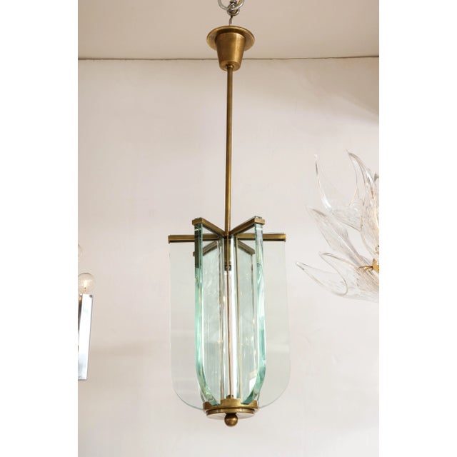Beautiful 1950's solid brass and glass Italian pendant attributed to Fontana Arte, in vintage condition with minor wear...