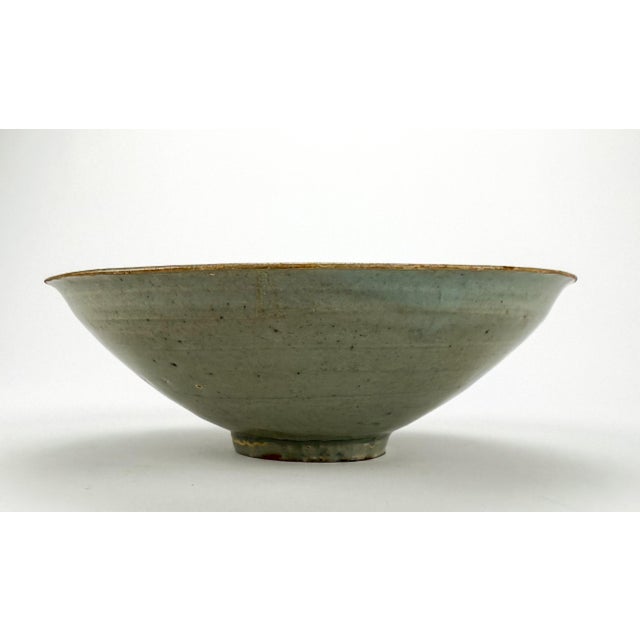A good example of an early Chinese porcelain Lotus bowl labeled on base. Possibly from the Sung period (960-1279), Ying...
