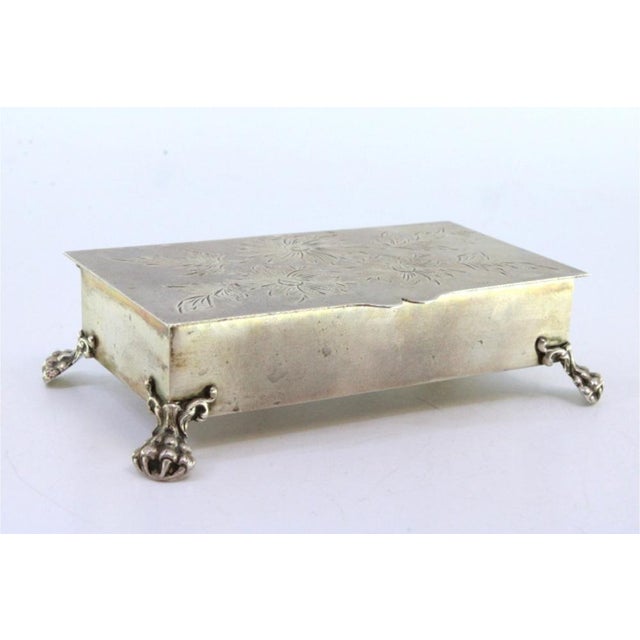 Silver Jewelry Box with Floral Motifs Engraved on the Lid and Resting on Four Claw-Shaped Feet For Sale - Image 6 of 8