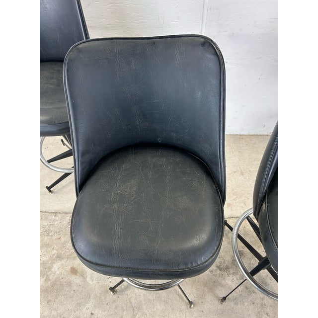 Set of 4 Mid Century Modern Black Vinyl Bar Stools For Sale - Image 11 of 12