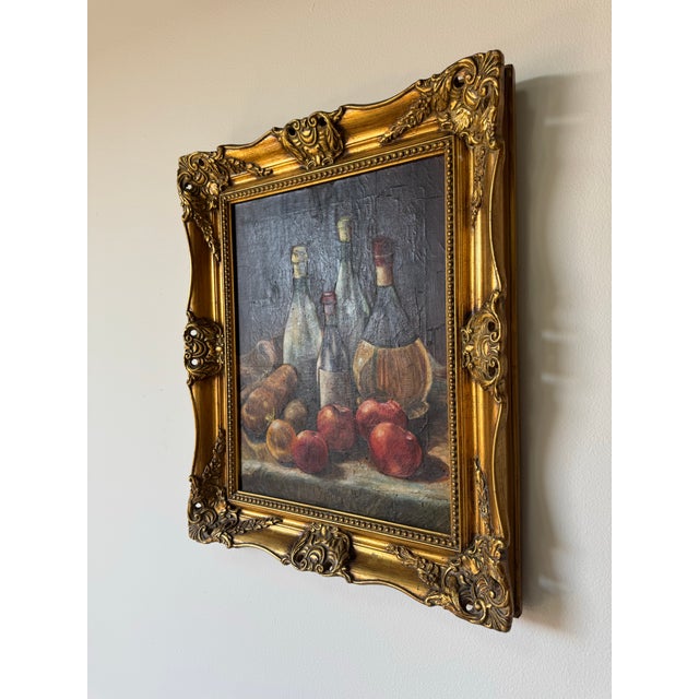 A beautifully composed 1970’s vintage Impressionist still life oil painting featuring a classic tabletop arrangement of...