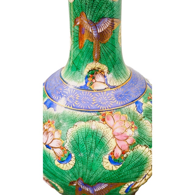 Mid-20th Century Famille Verte–Style Macau Porcelain Vase with Lotus and Bird Motif A striking mid-20th-century Chinese...
