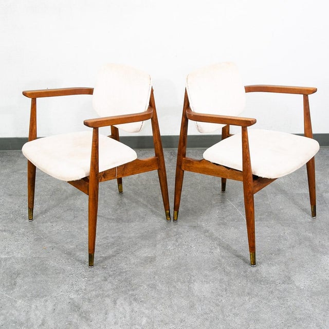 Beautiful pair of American chair company armchairs in an off white color. The frame is made up of solid walnut. Unique and...
