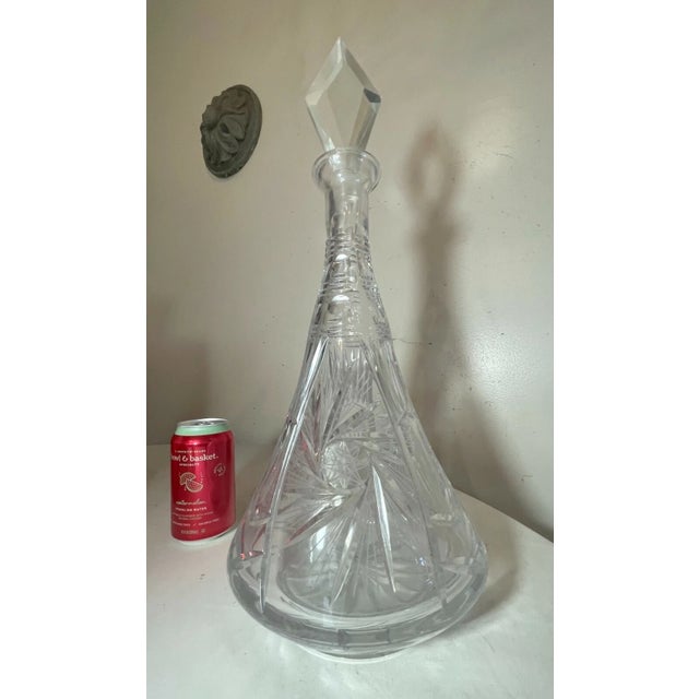 Up for sale is a huge vintage American brilliant cut clear crystal decanter. It's done with very elaborate detailing...