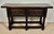 Striking Spanish console table from the late 19th century, crafted in solid walnut and inspired by traditional Baroque...