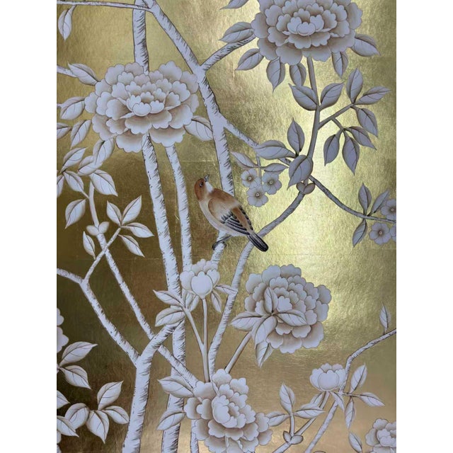Luxury handcrafted mural set finished with lustrous gold leaf backing, featuring classic chinoiserie design of delicate...
