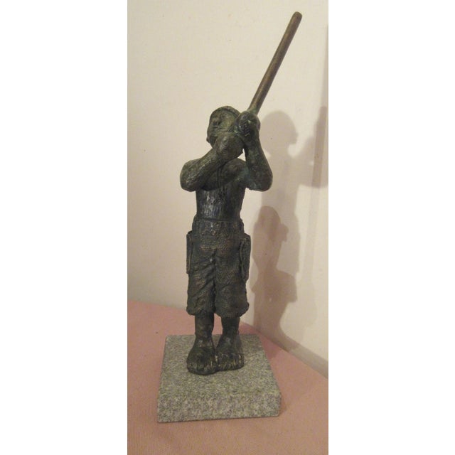 Up for sale is a wonderful quality signed antique solid bronze Japanese fisherman statue. It's done with a stylized...