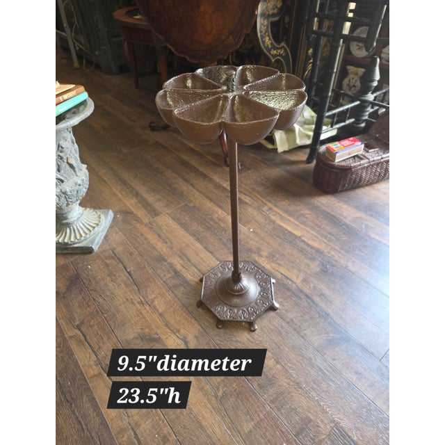 Sometimes reffered to as Cobbler's nail caddy, this cast iron stand is great for a variety of uses.