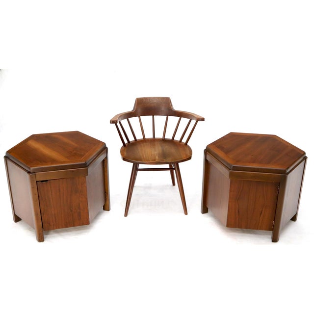 Mid-Century Modern pair of walnut hexagon shape one door storage compartment end side tables.