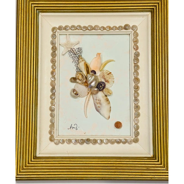 Lovely pair of sea shell art nstallations, such gned and framed, stamped verso from a Florida gallery.