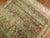 Stunning Persian Malayer rug from the early 20th century with a green field color, accents in terracotta, pink and brown....
