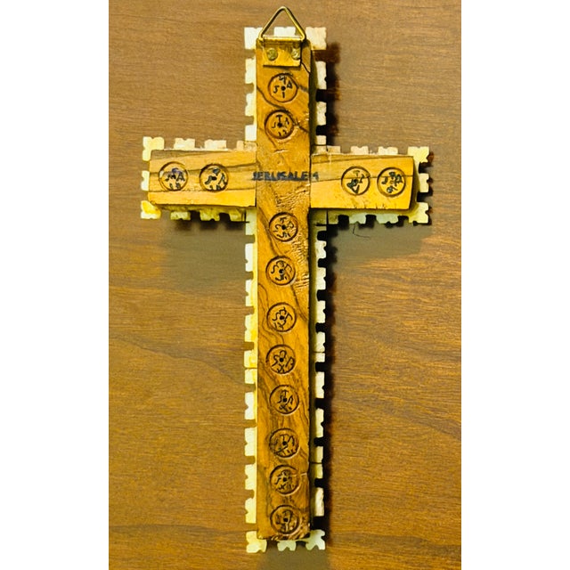 This beautiful mid-century crucifix was handcrafted in the Holy Land. The mother-of-pearl inlay is arranged in a handsome...