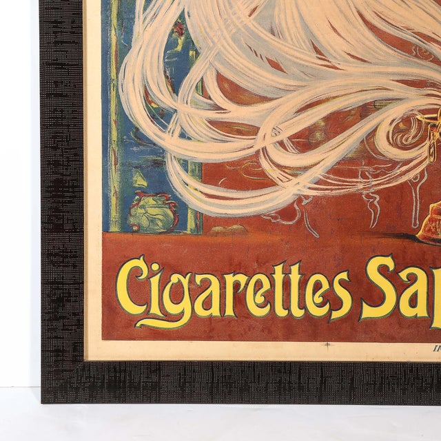 This Art Nouveau advertisement poster for Cigarettes Saphir, France, circa 1910, is an exquisite example of the flowing...
