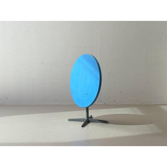 A distinctive Swiss garden table by BIGLA Sissach with a folding round tabletop and a functionalist, industrial design....