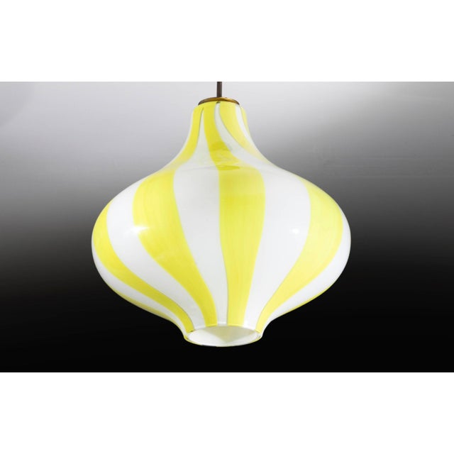 The Cipolla pendant lamp (model 4039) is an icon of Italian design. Designed by renowned graphic designer Massimo...