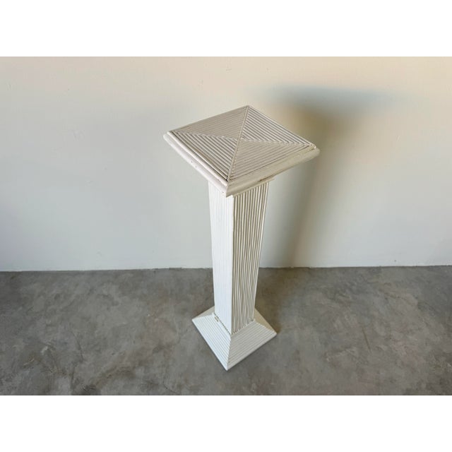 Available for sale this fantastic 1980's Vintage white pencil reed handcrafted pedestal or plant stand. Perfect for...