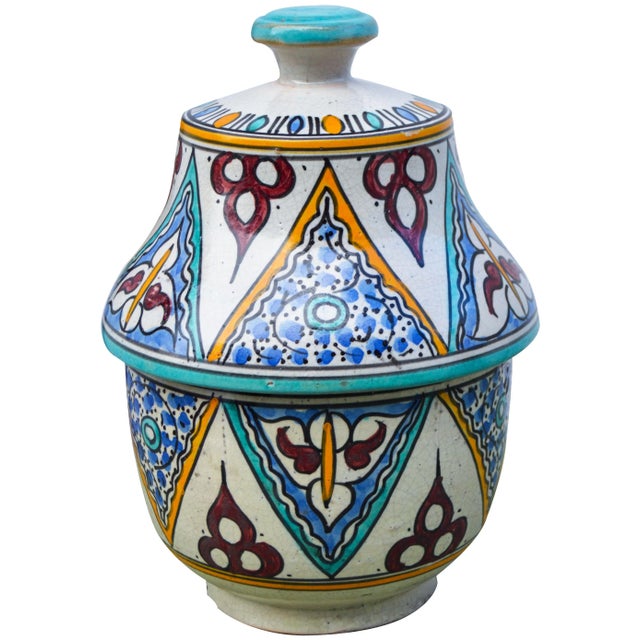 Antique handcrafted and glazed ceramic box from Fez, Morocco. Features an intricately hand-painted Moorish pattern in a...