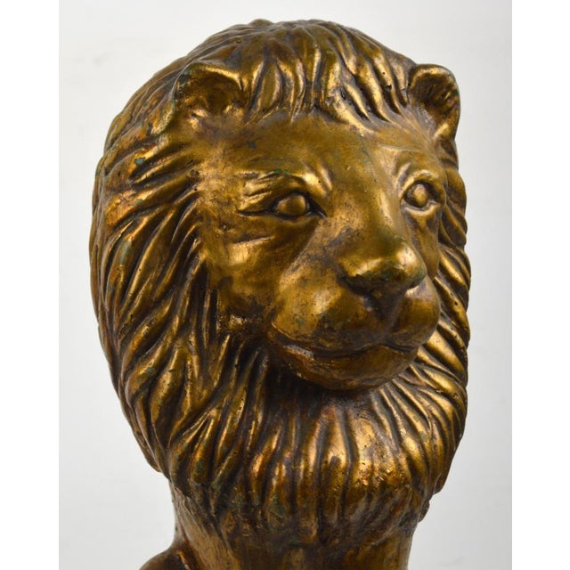 A very appealing vintage gold tone, cast stone, Leo the Lion sculpture. Solid and heavy. Suitable for outdoor or indoor...