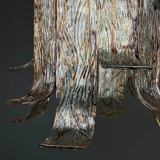 Gorgeous very rare murano glass chandelier by av mazzega made in italy in the 1970s. Av mazzega was founded in 1946 by...