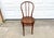A piece of living history, this handcrafted bentwood side chair embodies the elegance of the great European café era....