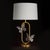 The Monarch's delicate looking steel frame dusted in a light gold leaf finish is set set off by two clear glass...