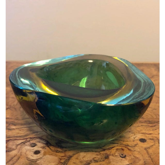 Beautiful mid-20th century Flavio Poli Murano sommerso bowl in vibrant layers of aqua blue, yellow and green.