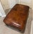 Fantastic high quality Berkshire leather patch ottoman. Expert craftsmanship. High quality leather.