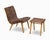 Here is an early Model 654 chair with accompanying ottoman by Jens Risom for Knoll Associates, 1941. This example in its...