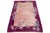 This beautiful, small antique Chinese Art Deco rug is hand-knotted from high-quality wool. Its soft pink background is...