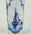 Elegant vintage dutch delft blue vase, made and hand-painted in the netherlands during the 1950s. This tall cylindrical...