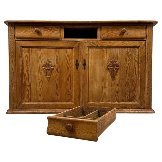 A handsome 19th-century English Victorian cupboard, finely crafted from pitch pine and distinguished by its generous...