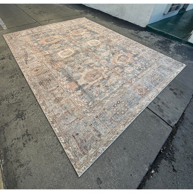 Design Plus Gallery presents the 8ft 6in × 11ft 7in Ocean Spice Margot Area Rug from Loloi. The rug is power loomed of...