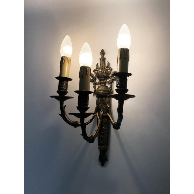 Magnificent pair of bronze sconces with louis xv style fire pot here we have a magnificent pair of french louis xv 3 light...