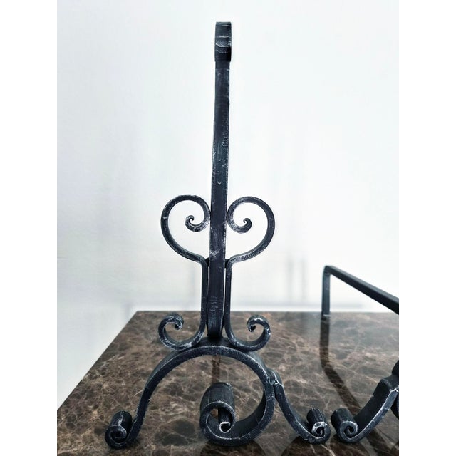 These wrought-iron fireplace andirons showcase timeless design and exceptional Italian craftsmanship. Designed to support...