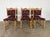 This set of six dining chairs is constructed in solid oak and was produced in Denmark, likely during the 1960s or 1970s....