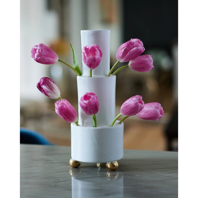 Handmade in Italy, this ceramic tulipiere makes the art of arranging flowers effortless. Available in all white, white...