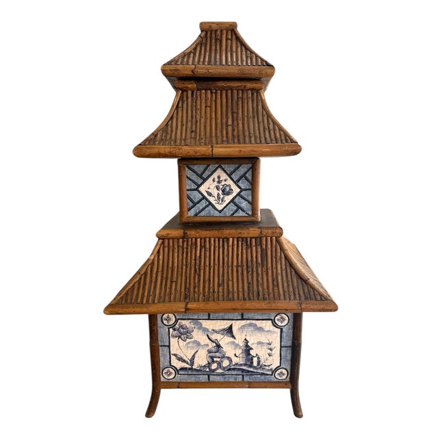 Tall rattan pagoda style Chinoiserie box. Five sections stacked on each other with compartments for storage. Pagoda style...