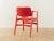 Unique armchair from the 1960s. Frame in red lacquered oak wood. The chair has been reupholstered and covered with a high-...