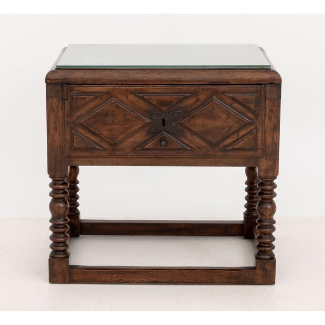 Spanish Baroque Style Walnut Side Table, 19th century, with carved diamond motif to the single drawer above bobbin-turned...