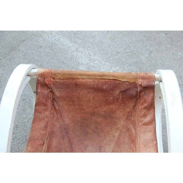 Original white and brown Aulenti Gae rocking chair, 1960s, Sgarsul, for Poltronova. The general conditions are as shown in...