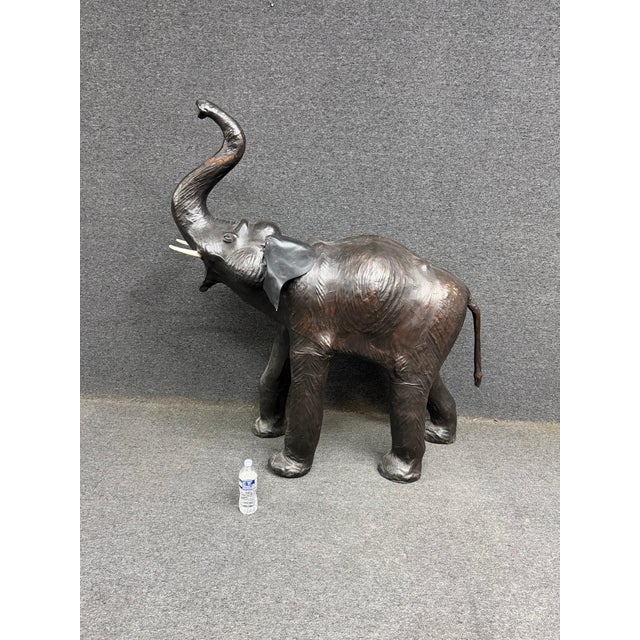 Whimsical and wonderfully detailed life-size baby elephant originally purchased from FAO Schwarz in New York City, a...
