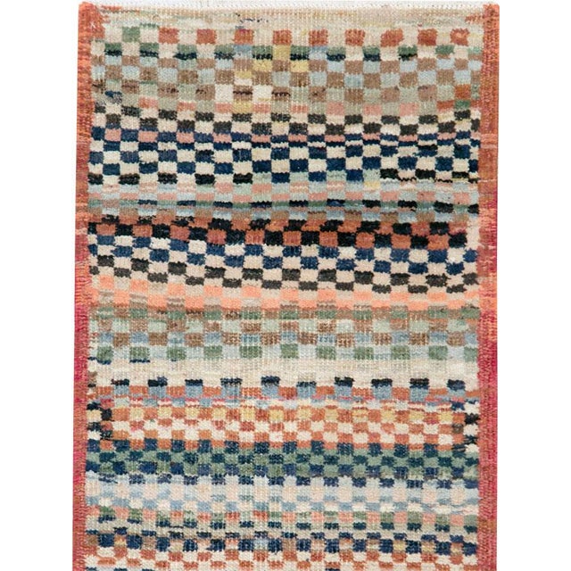 A vintage Turkish Anatolian modern style runner handmade during the mid-20th century. Measures: 1' 11" x 11' 2"