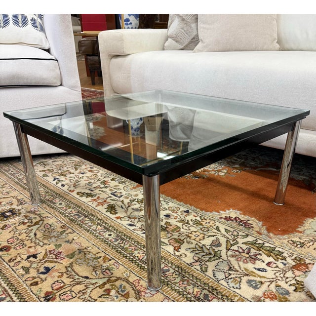 Signed Cassina LC10-P low Le Corbusier cocktail table designed by Pierre Jeanneret. All hallmarks are present as shown. An...
